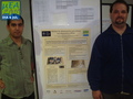 Christian y Diego con el poster del mdulo de alim.